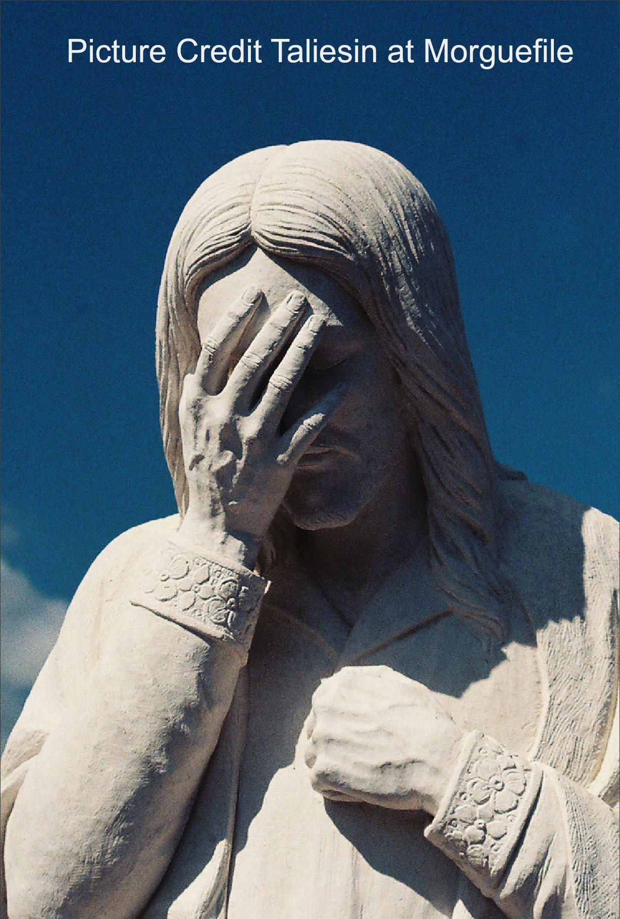 Statue with head in hand