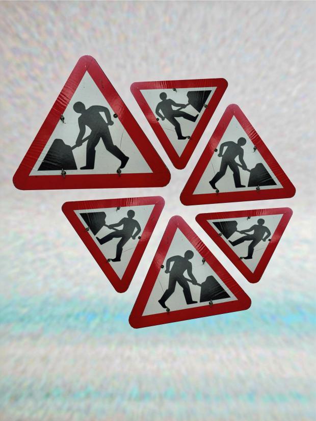 Road Signs Showing Men Working 